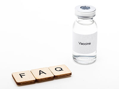vaccine vial and faq scrabble pieces image